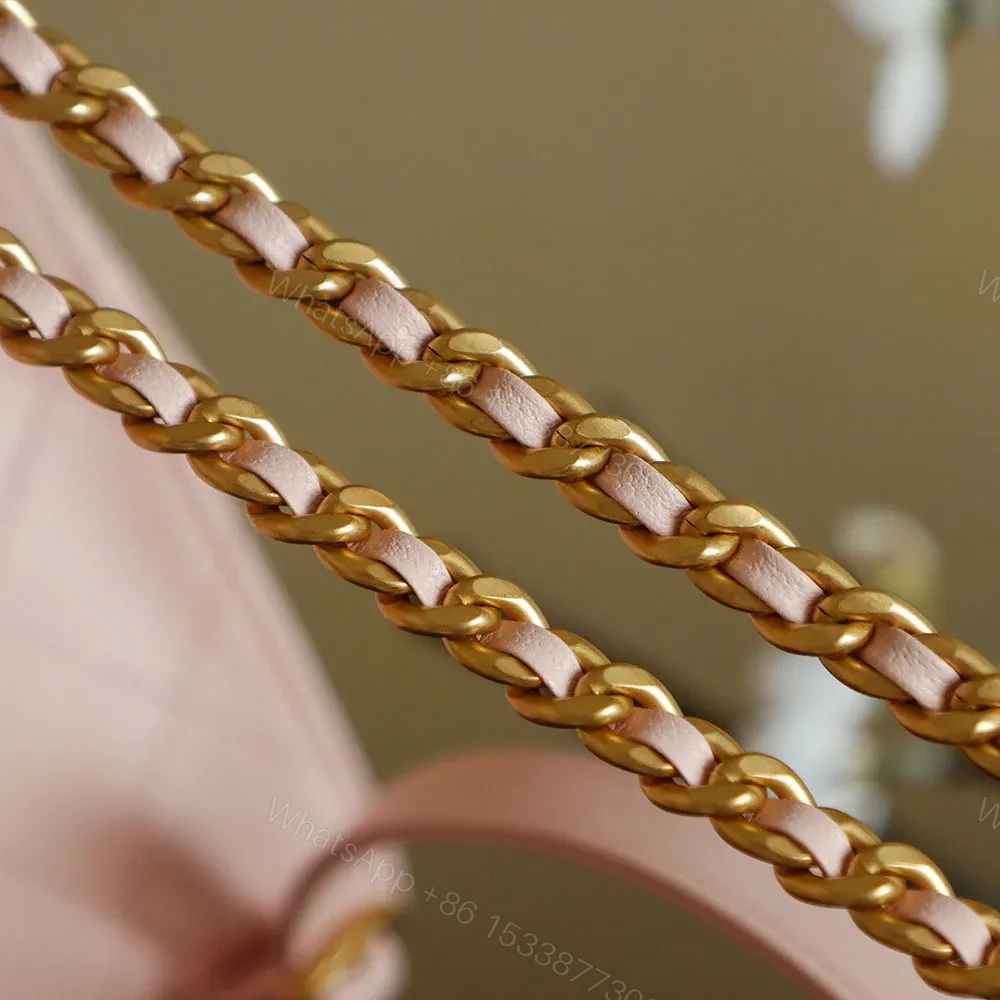 View 7 of Soft Pink Quilted Bucket Bag with Gold Charm, Faux-Leather Bag