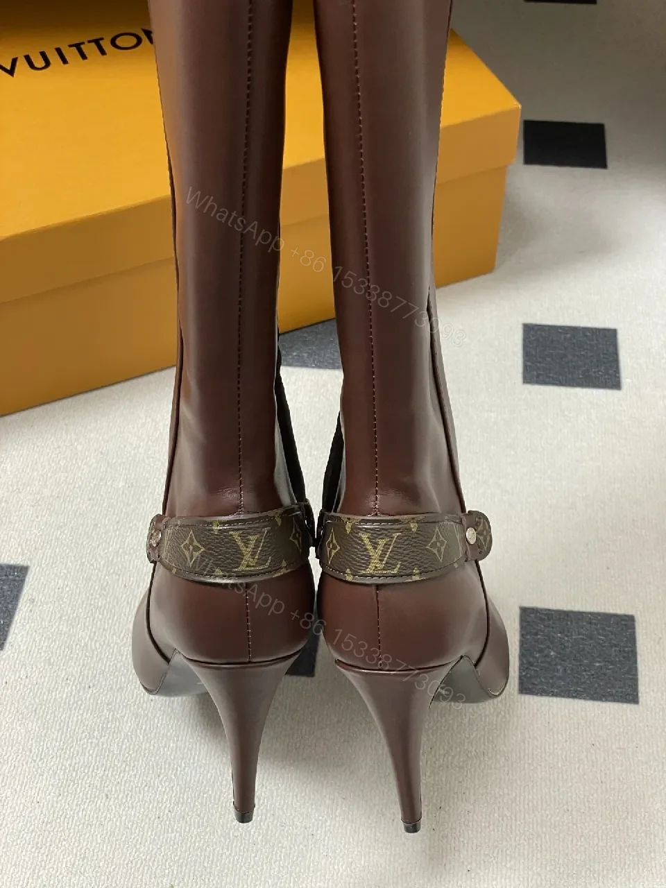 View 9 of Brown Leather Knee-High Boots with LV-Accent Details