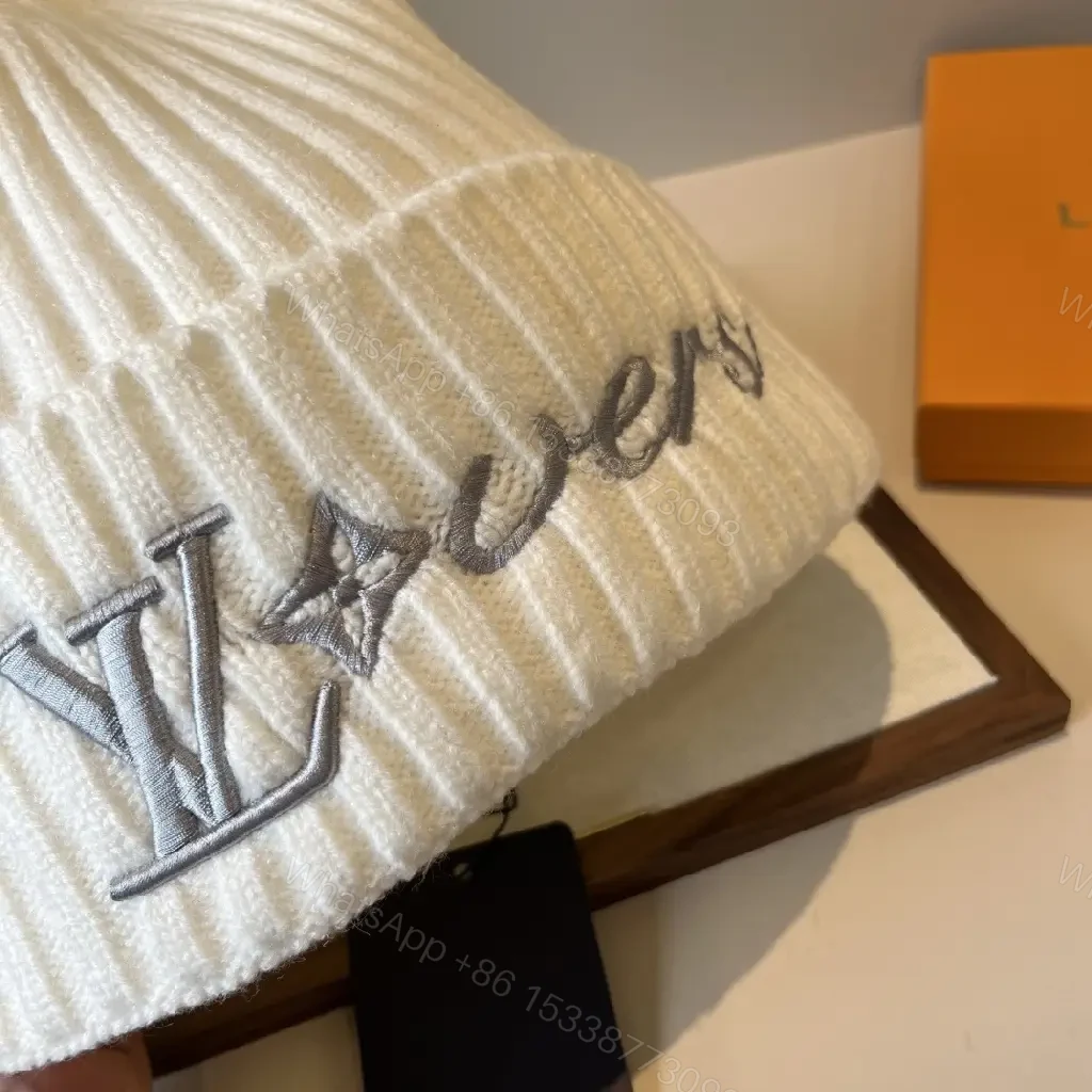 View 4 of Neutral Ivory Knit Beanie with Premium Embroidery Warmth