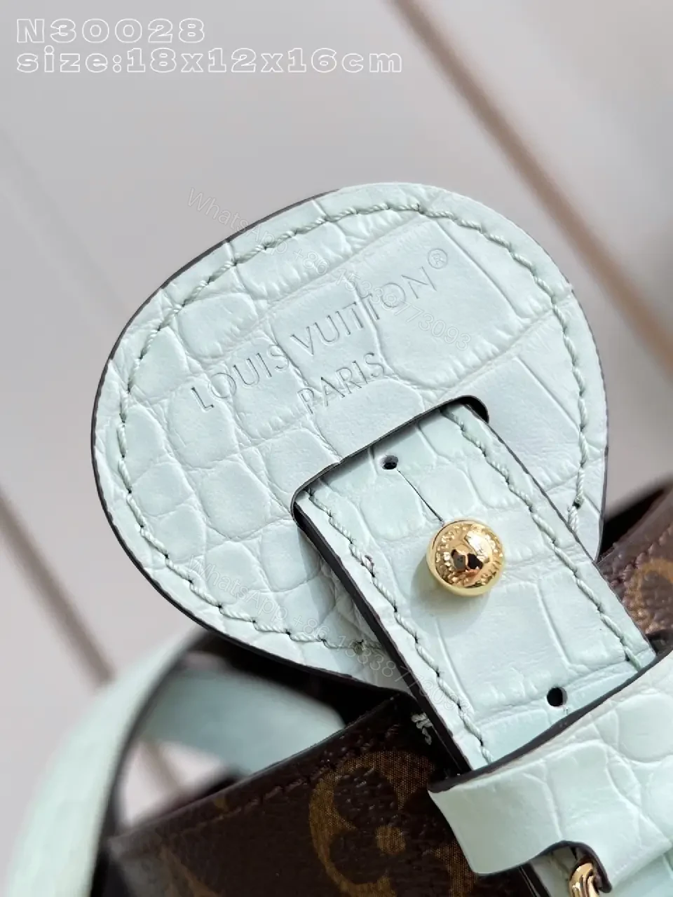 View 3 of Brown Monogram Bucket Bag: Structured Crossbody with Aqua Strap