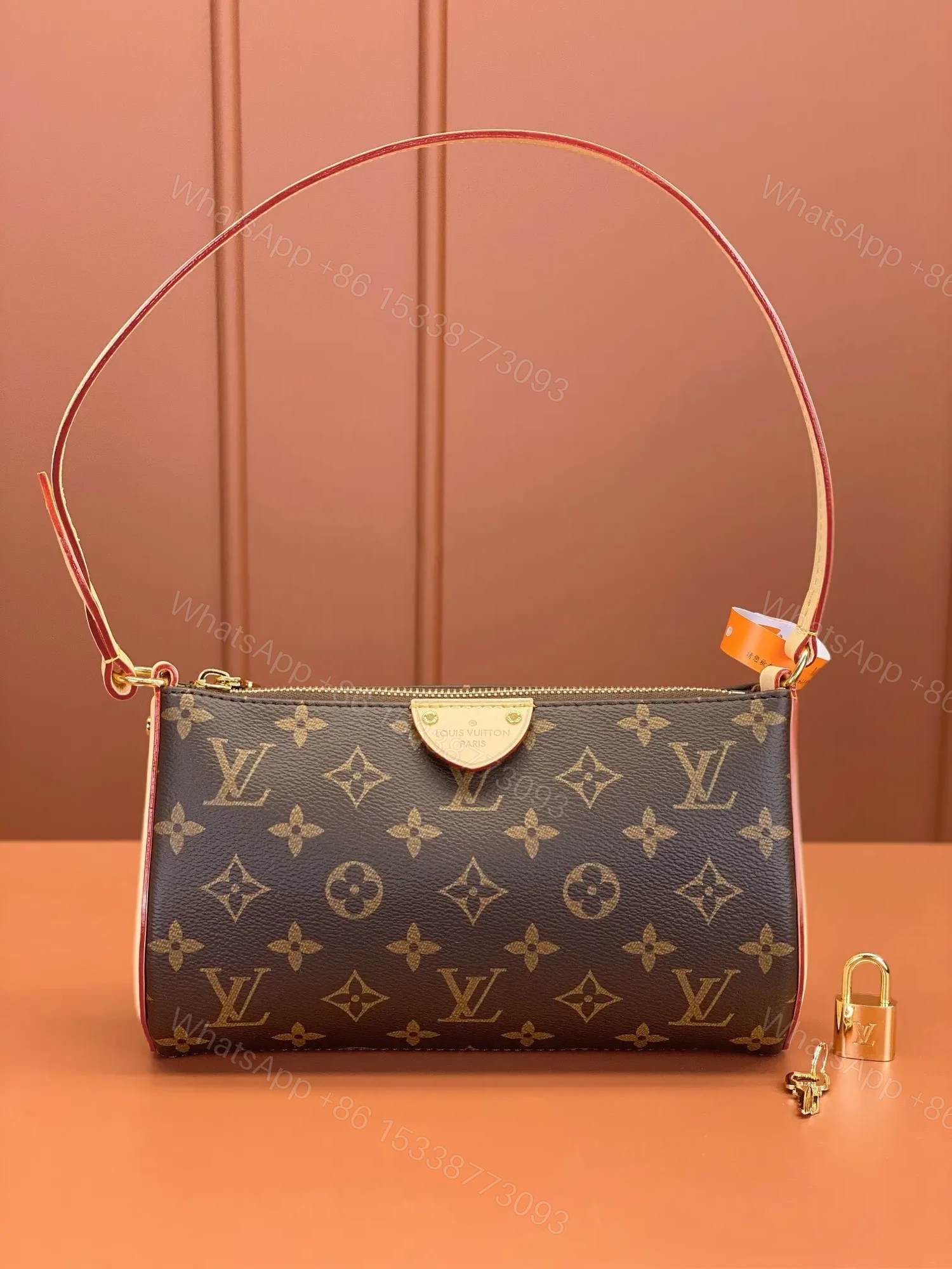 Louis Vuitton Pochette Tirette bag in monogram coated canvas — view 1