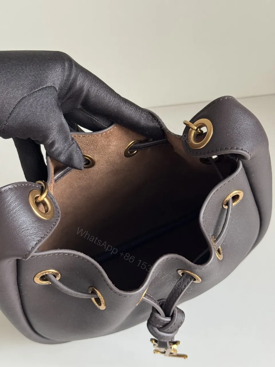 View 9 of Deep Black + Leather + Minimalist + Gold Hardware + Bucket Bag