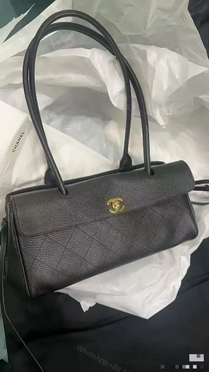 View 6 of Quilted Black Leather Handbag with Gold Hardware Luxury