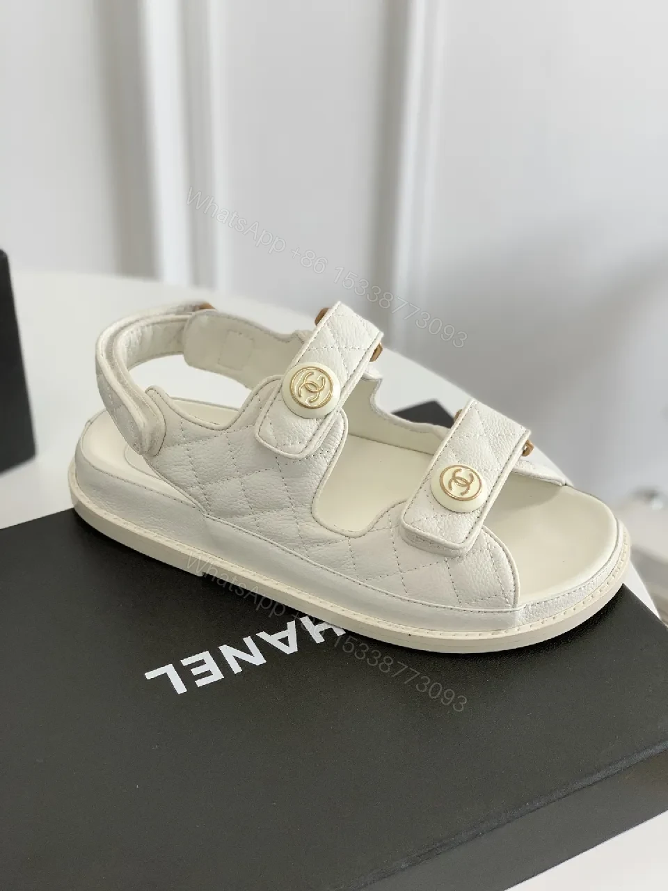 View 6 of White Quilted Sandals with Gold Emblem – Luxe Comfort Sandals