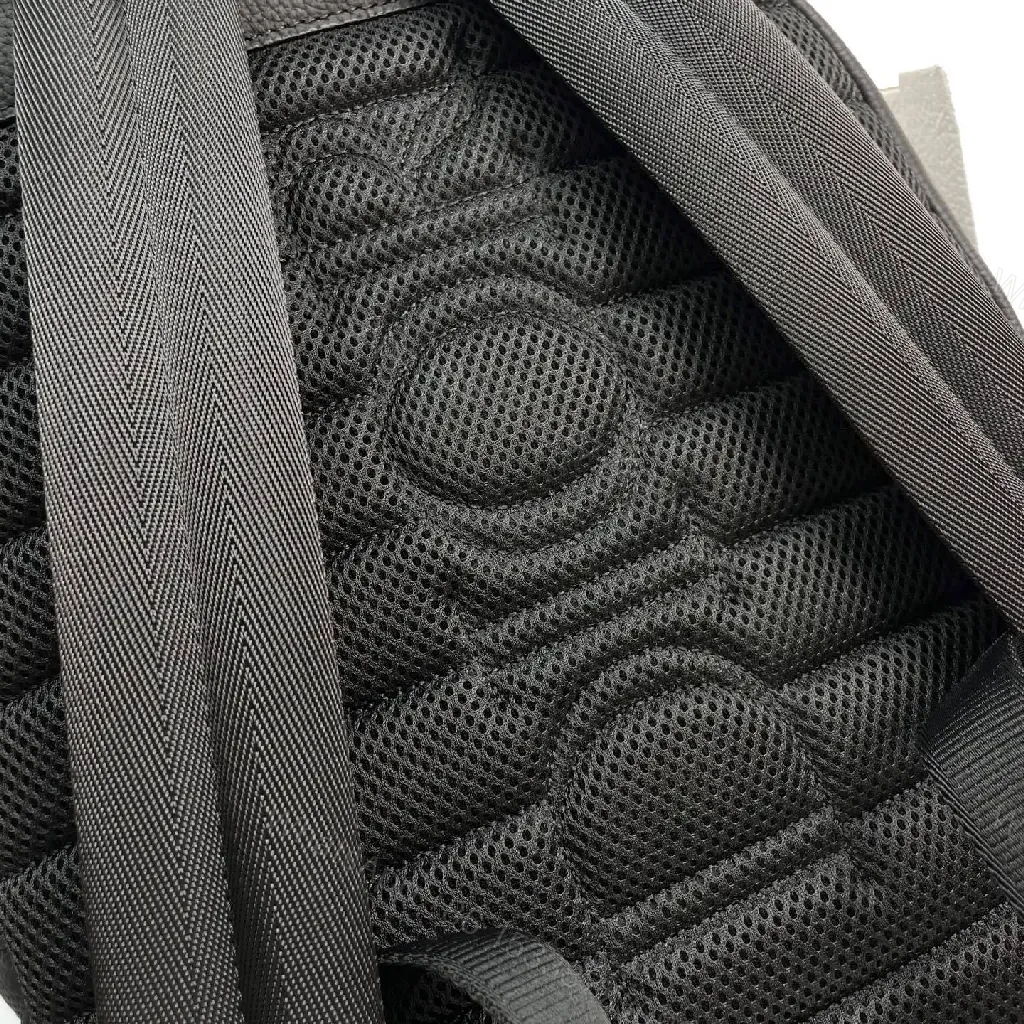 View 3 of Compact Embossed Leather Backpack: Subtle Luxury, Everyday Utility