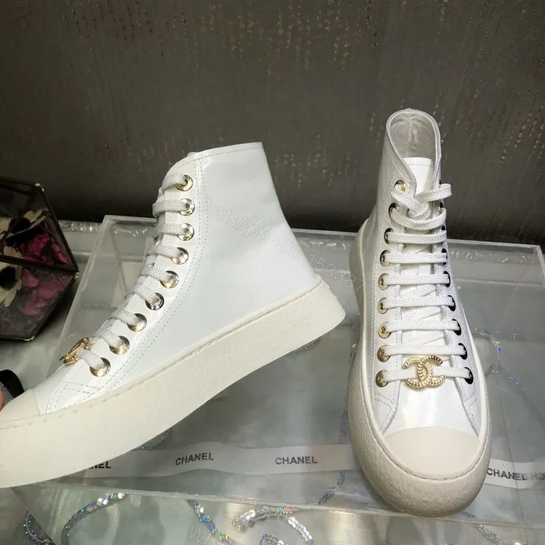 View 7 of Premium White High-Top Sneakers with Gold Emblem