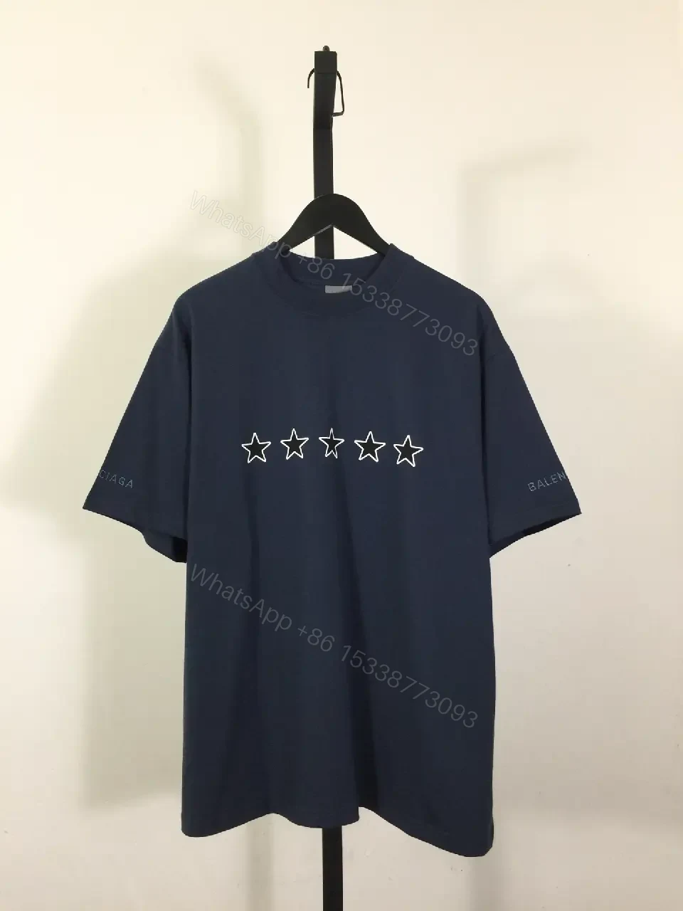 View 5 of Minimalist Star Tee: Luxe Comfort, Subtle Branding, Navy