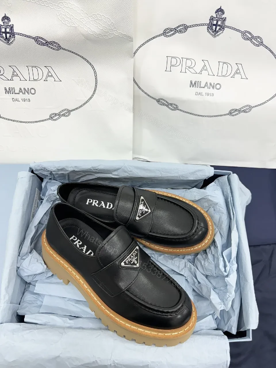 View 3 of Black Leather Loafers: Luxe Signature Crest, Rugged Comfort