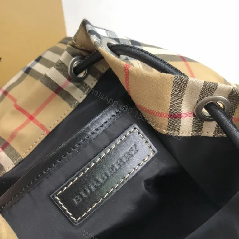View 9 of Burberry-Inspired Plaid Compact Backpack with Leather Trim