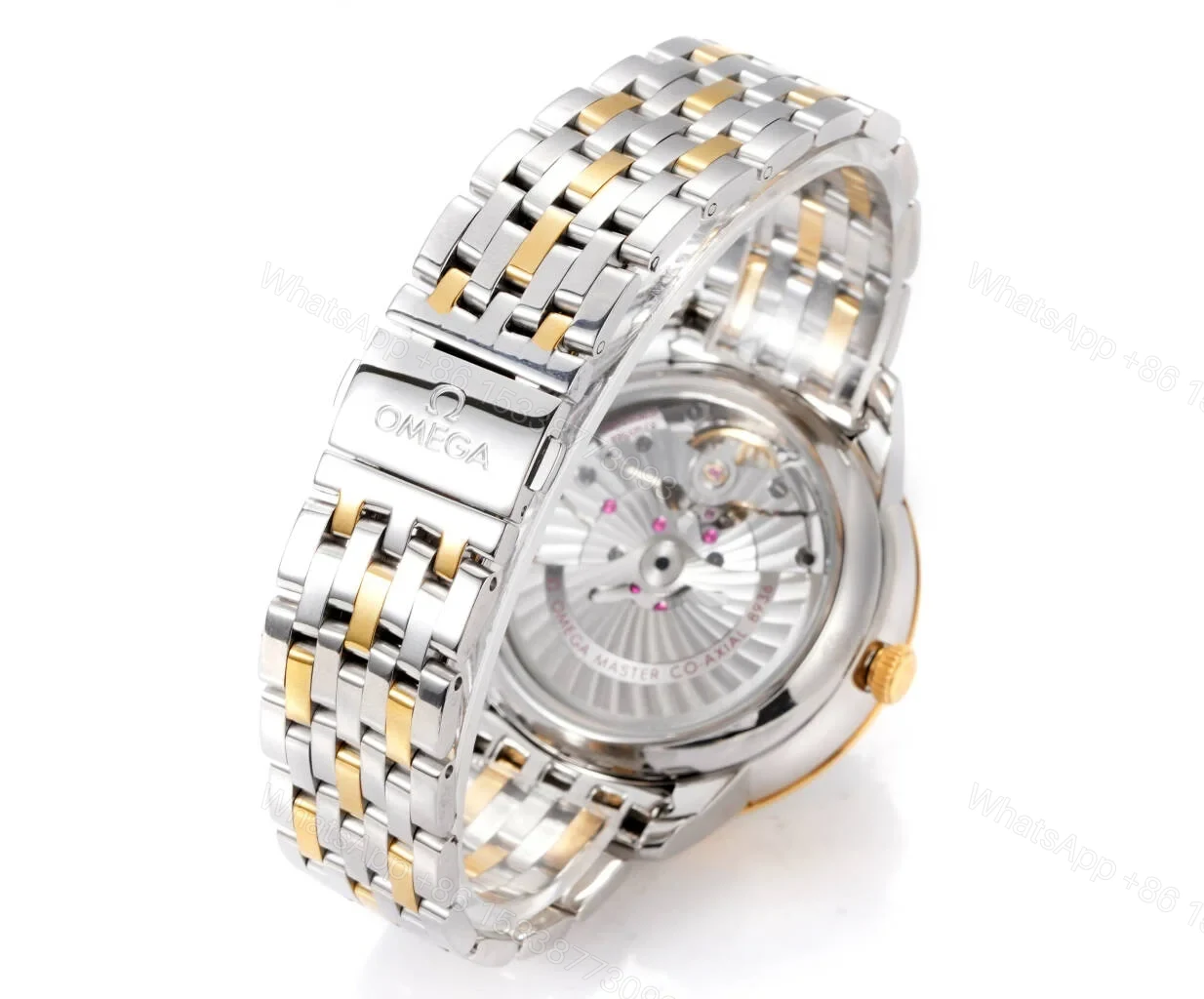 View 7 of Omega De Ville Prestige Co-Axial Master Chronometer Pointer Date 42 Stainless Steel Yellow Gold Green Sunburst Bracelet 434.20.42.22.10.001