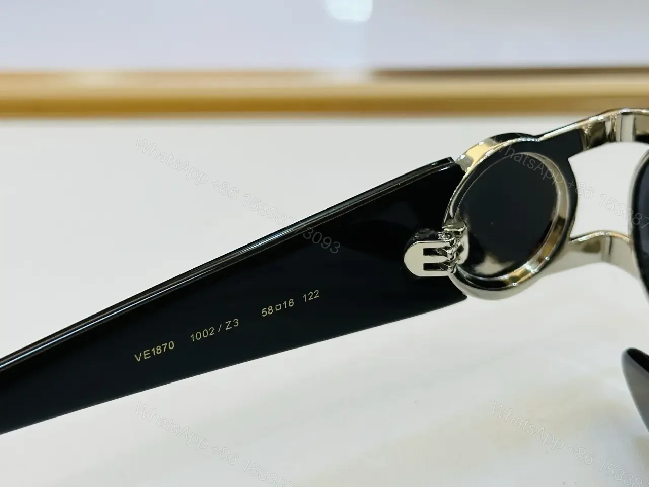 View 3 of Gold-Tone Frame Sunglasses: Luxe Comfort, Bold Attitude