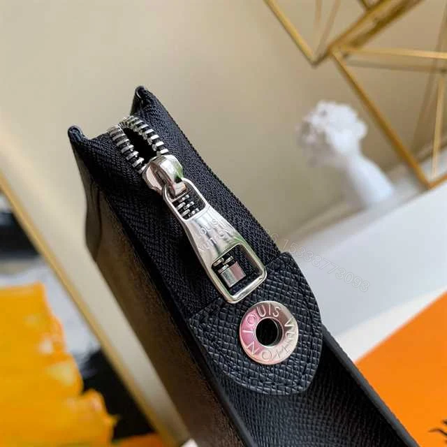 View 3 of LOUIS VUITTON POCHETTE VOYAGE MM TAIGA LEATHER M30675