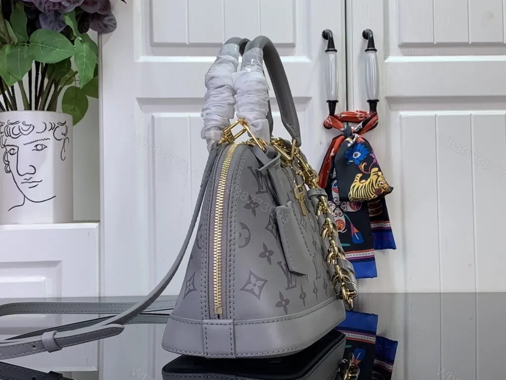 View 2 of Monogram Satchel: Structured Luxury, Everyday Versatility