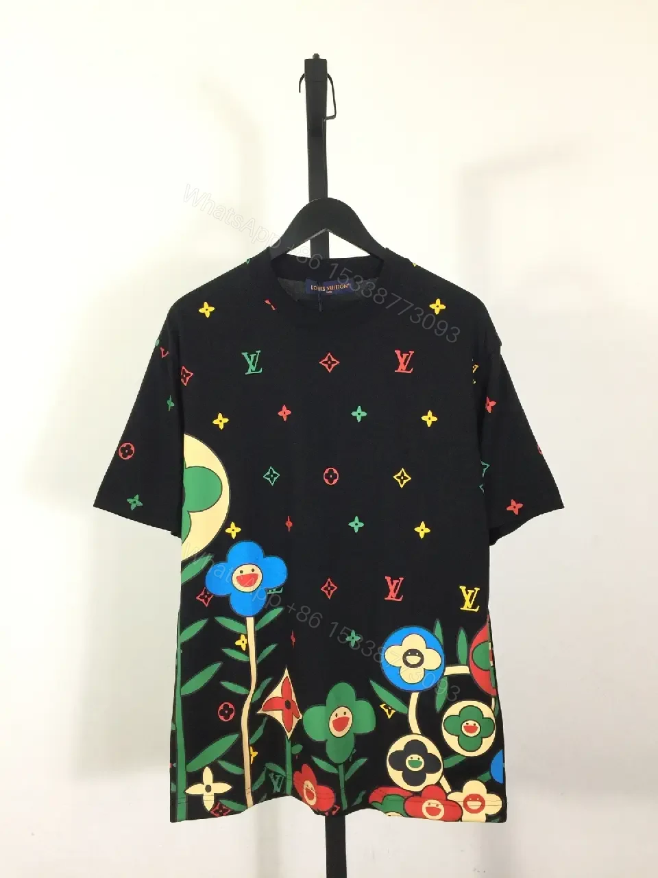 Bold Floral Monogram Tee: Luxe Streetwear Essential — view 1