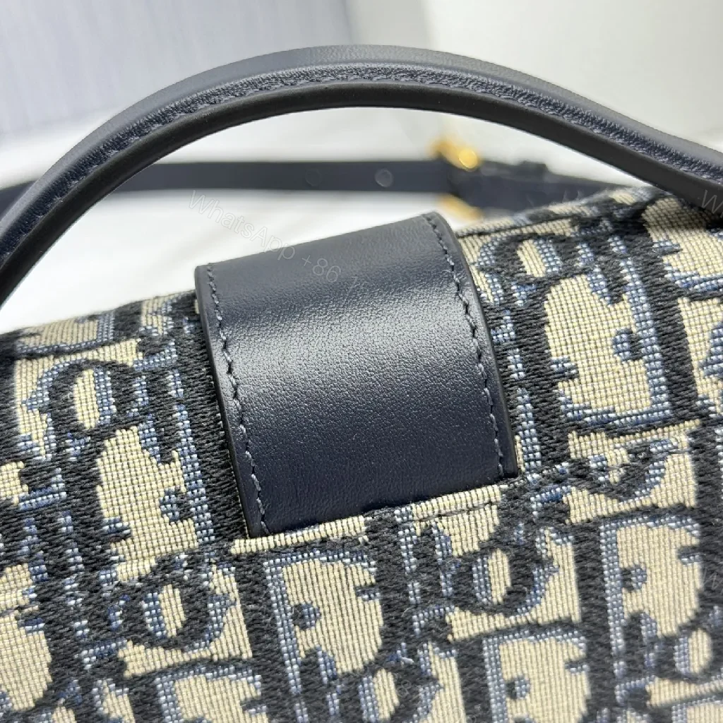 View 5 of Signature Crossbody: Lux Canvas, Gold Hardware, Compact Night-Ready