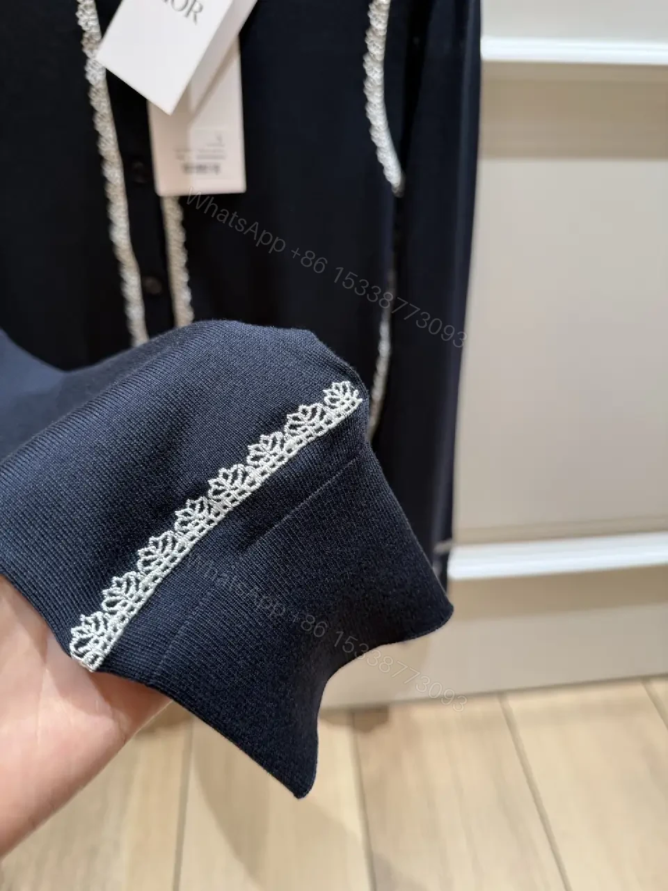 View 11 of Navy Knit Cardigan: White Piping, Modern Contrast, All-Day Comfort