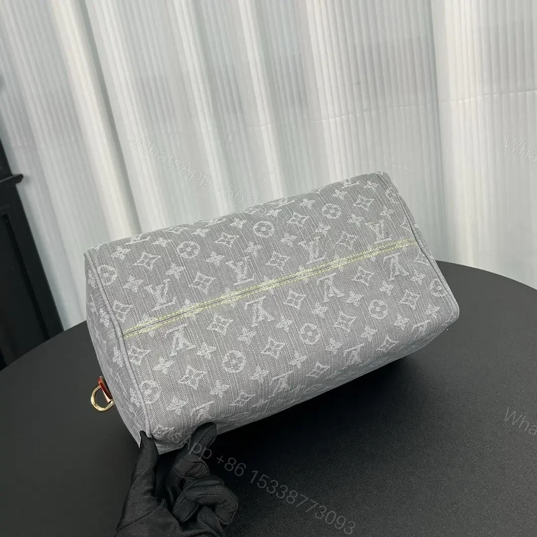 View 3 of Louis Vuitton Speedy Soft 30 bag in Monogram Denim canva