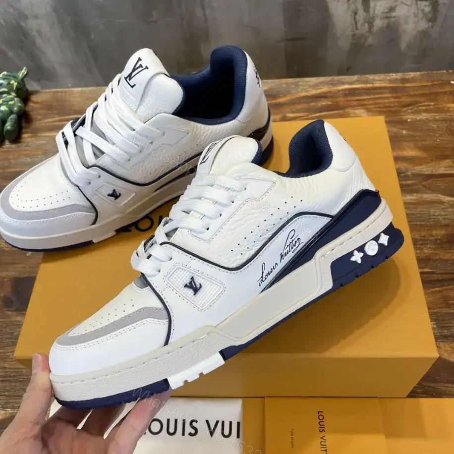 View 9 of LOUIS VUITTON LV TRAINER SNEAKERS IN WHITE AND NAVY BLUE – LSVT353