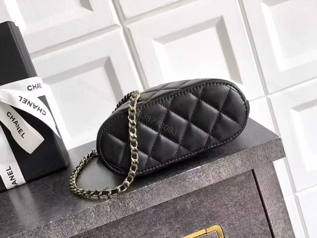 View 4 of Mini Quilted Black Bag with Gold Logo—Refined Daily Companion