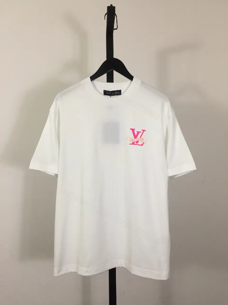 White Cotton Tee with Pink LV Emblem – Minimalist Luxe Top — view 1