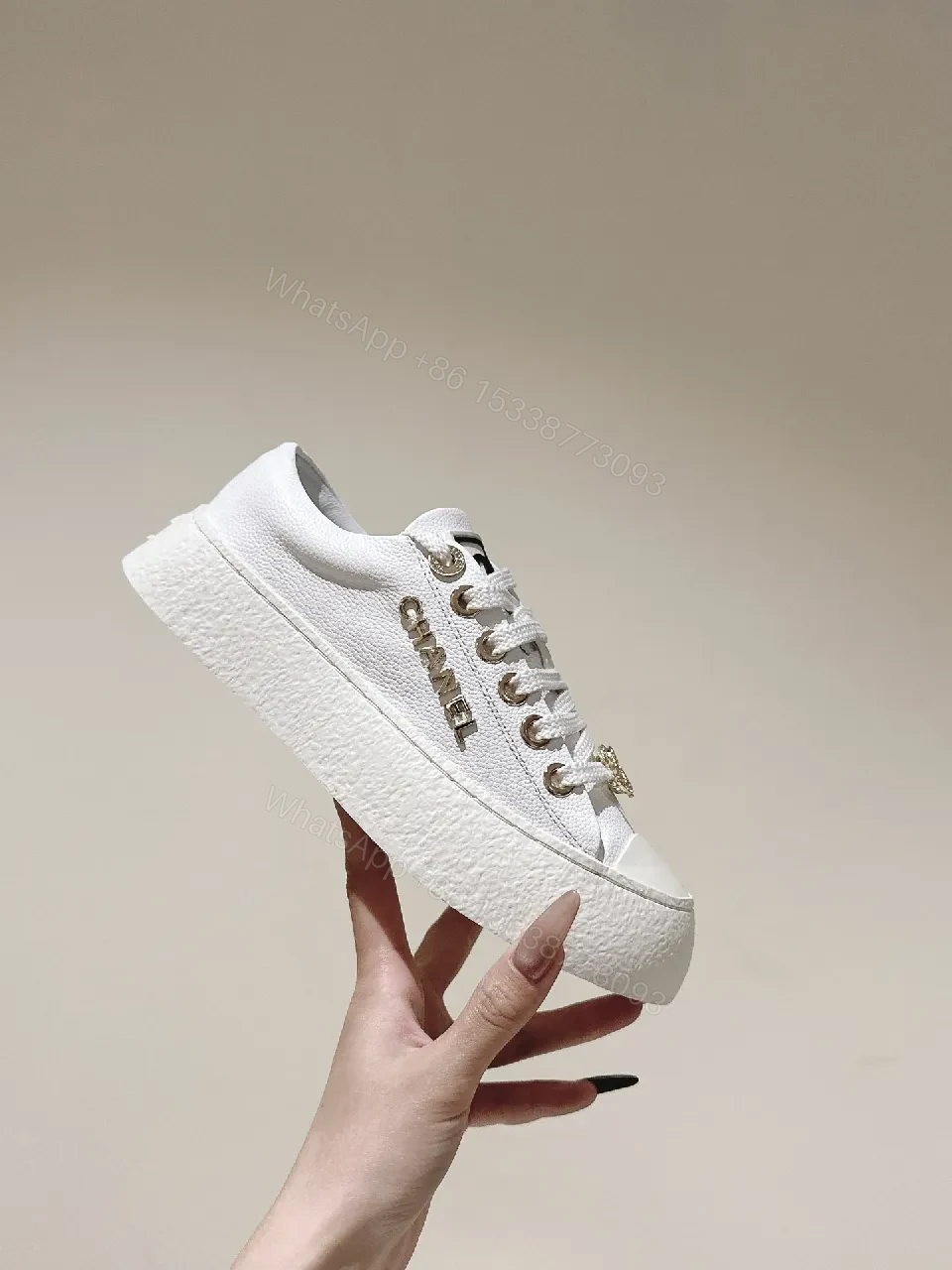 View 9 of White Leather High-Top Sneakers with Gold Accents