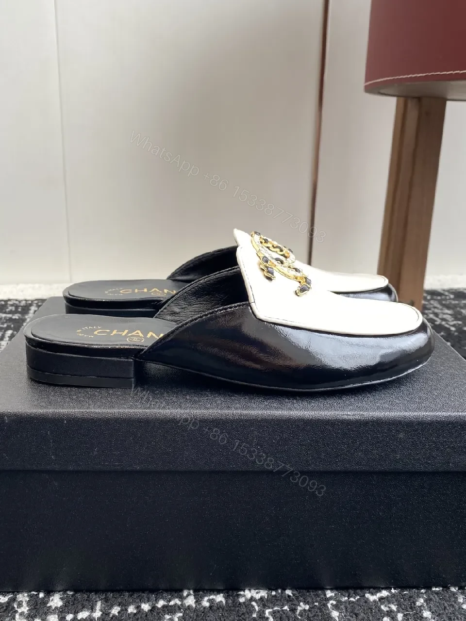 View 8 of Ivory-Black Leather Mules: Gold-C Logo Slip-Ons