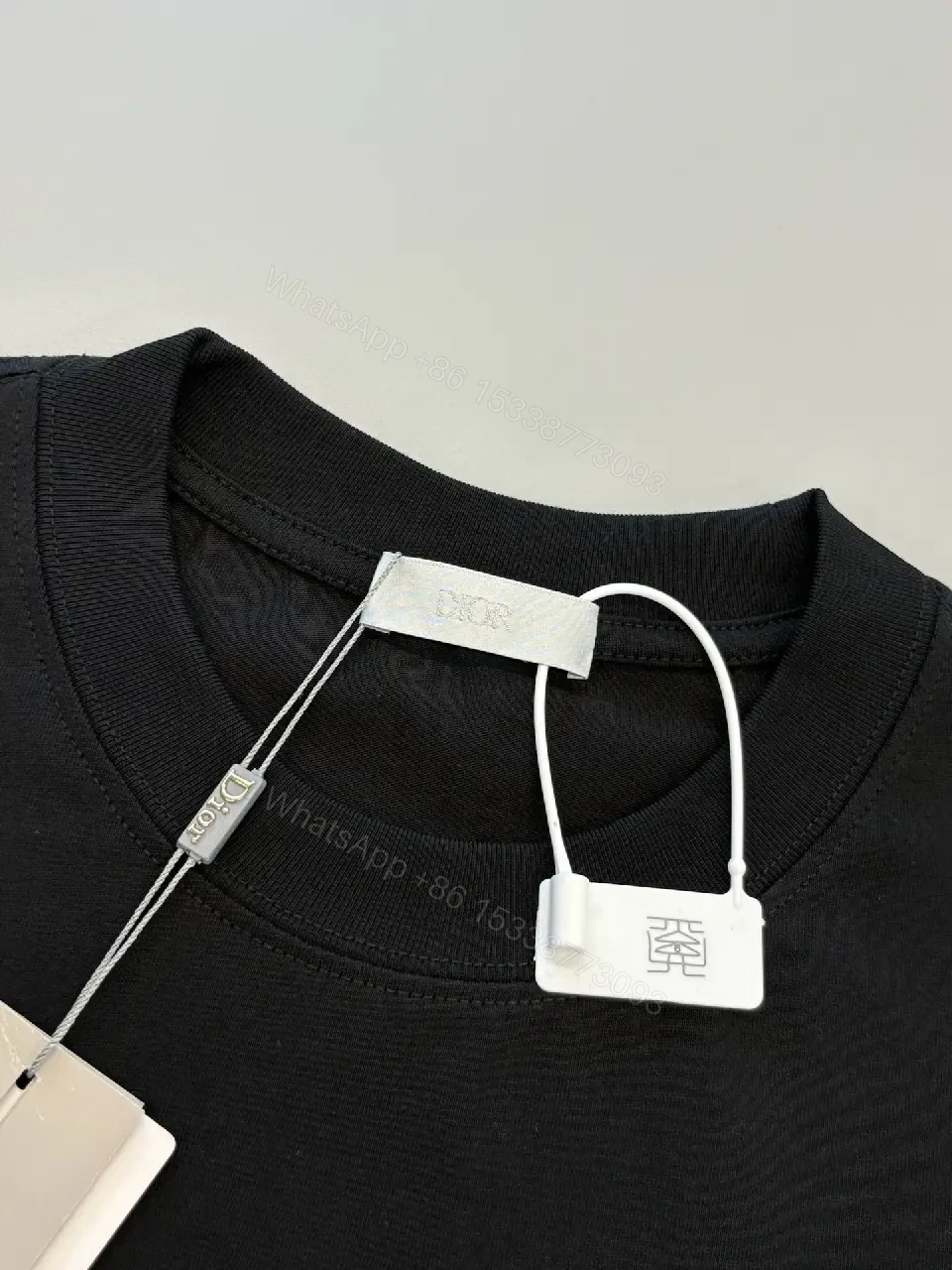 View 10 of Black Cotton DIOR Graphic Tee—Premium Streetwear Essential