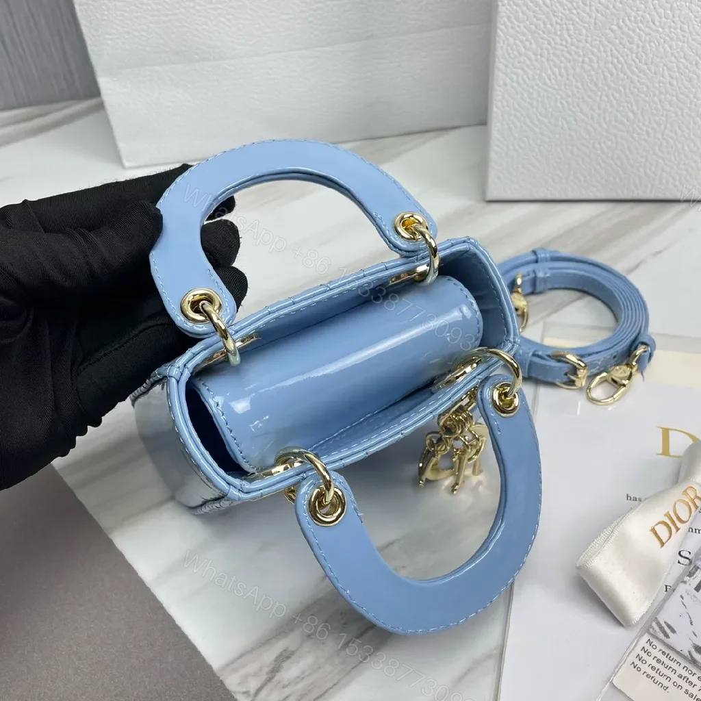 View 7 of Blue Quilted Mini Bag - Calf Leather, Crossbody/Top Handle, Magnetic Closure
