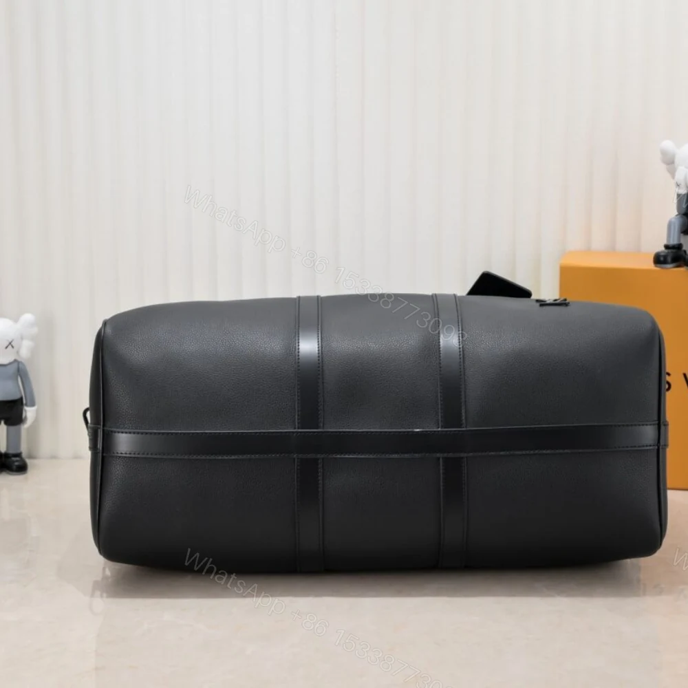 View 5 of Louis Vuitton Keepall Bandoulière 50 Black M21420
