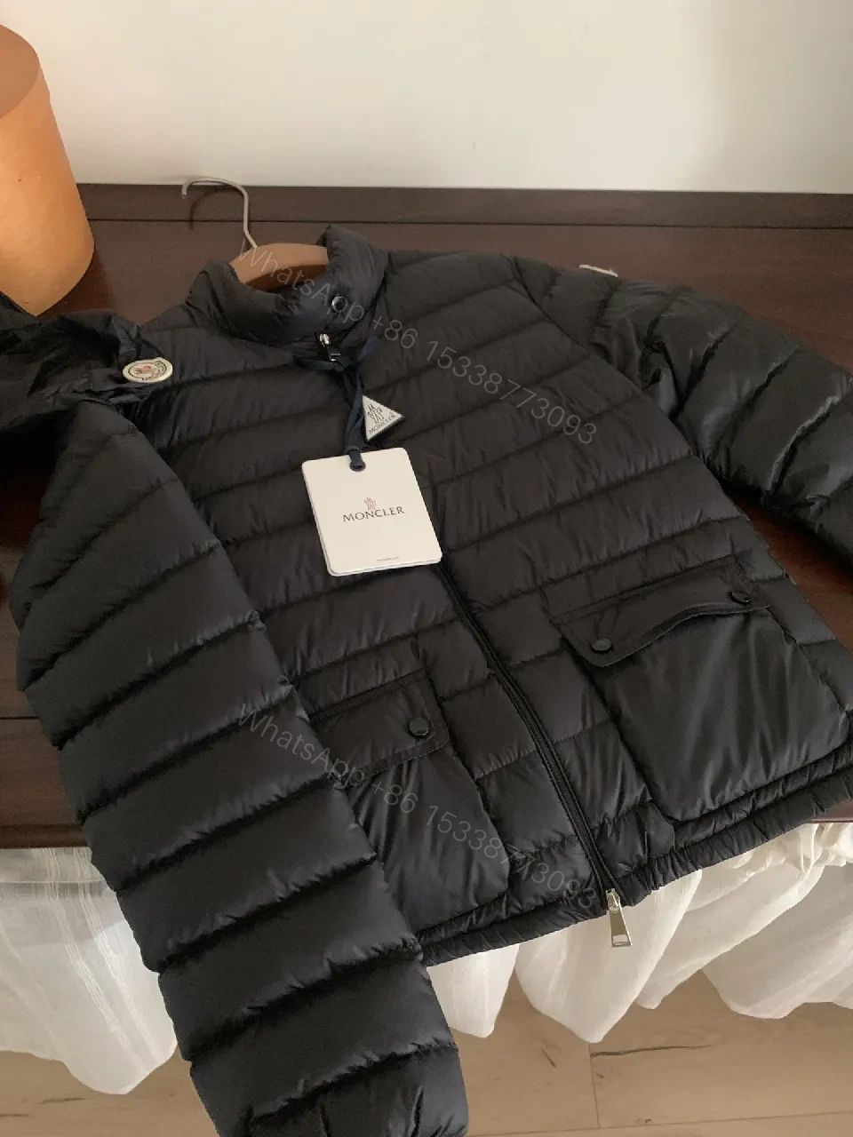 View 5 of Black Nylon Puffer Jacket: Sleek, Insulated Warmth with Patch