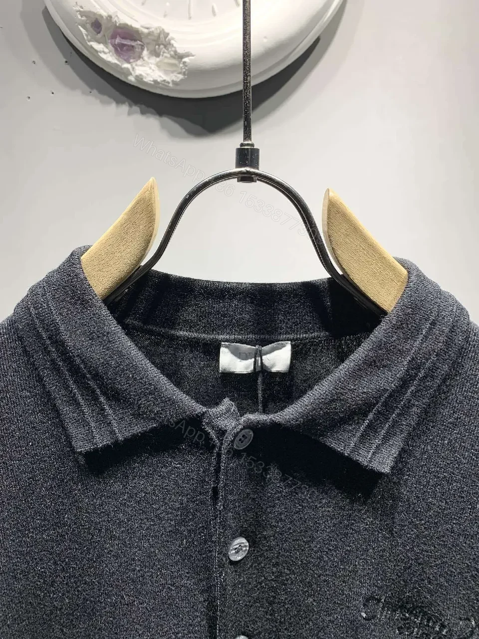 View 4 of Dark Knit Polo: Subtle Monogram Detail, Elevated Everyday Wear