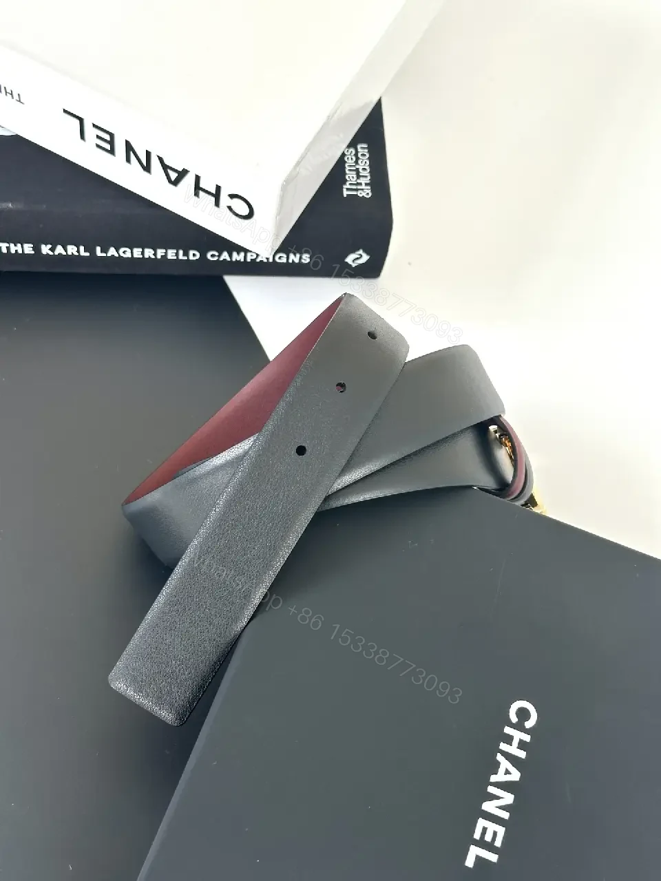 View 4 of Two-Tone Black/Burgundy Leather Belt with Gold Logo Buckle