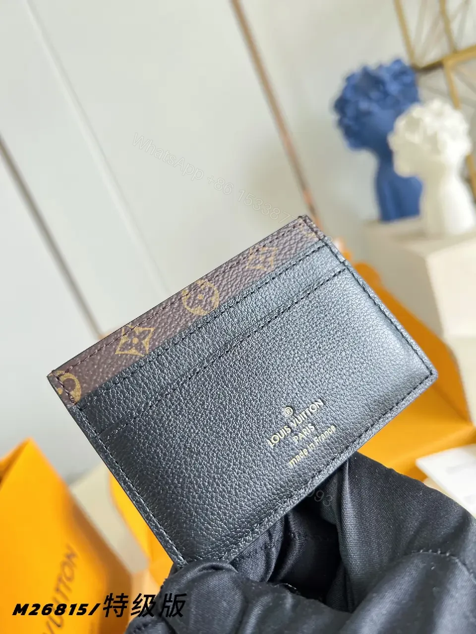 View 4 of Dark Navy Leather Bi-Fold Wallet with LV Monogram Texture
