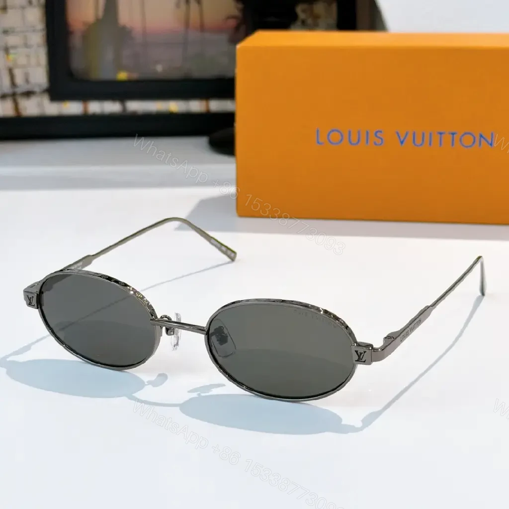 View 4 of Elegant Oval Sunglasses – Silver Metal, Polarized, Luxury Style