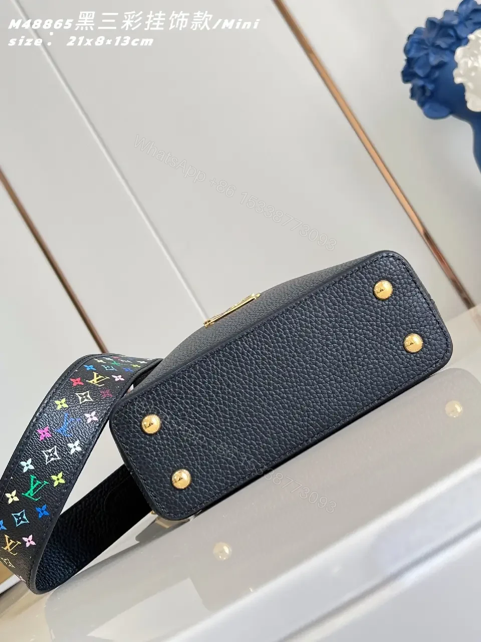 View 5 of Mini Black Satchel: Pebbled Leather, Gold Hardware, Bold Accent