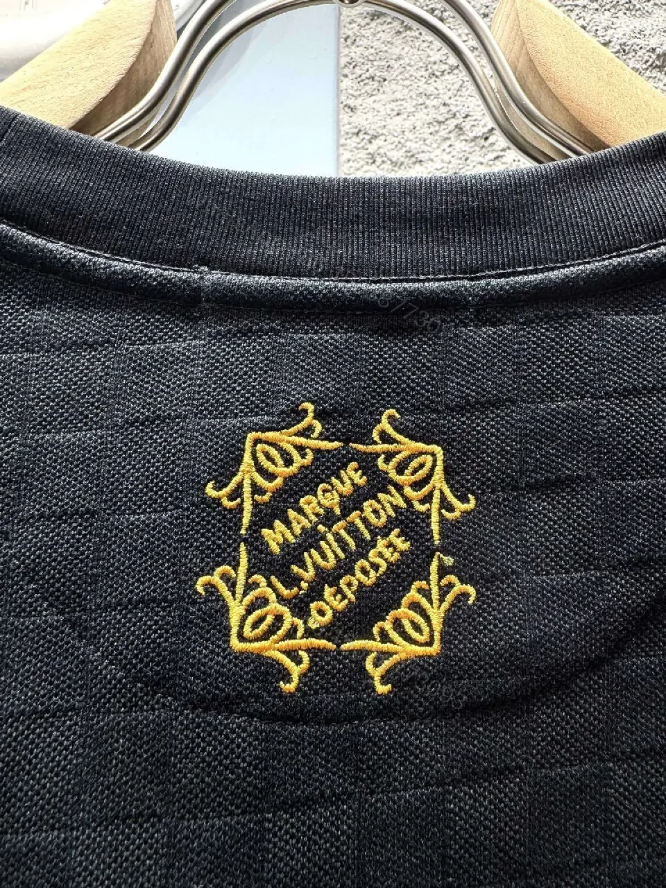 View 8 of Black Cotton Tee with Gold Logo Embroidery – Modern Luxury Casual