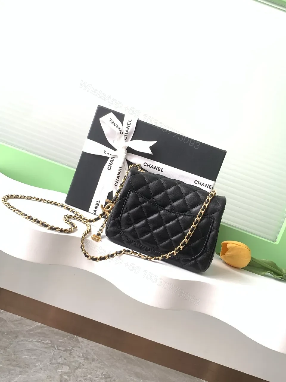View 7 of Black Quilted Calfskin Bag - Modern Flap, Gold Chain, Luxe Essential
