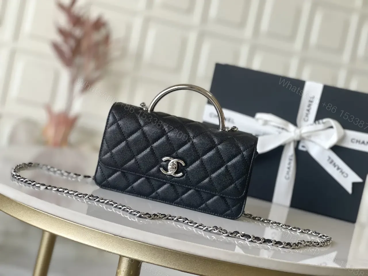 Black Quilted Leather Mini Bag - Chain Handle, Compact Luxury — view 1