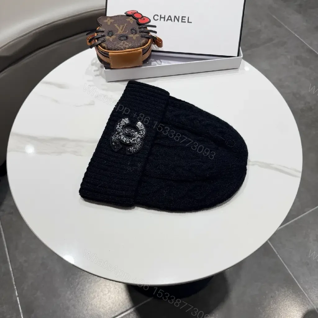 View 9 of Black Knit Beanie with Subtle Crest – Lux, All-Season Comfort
