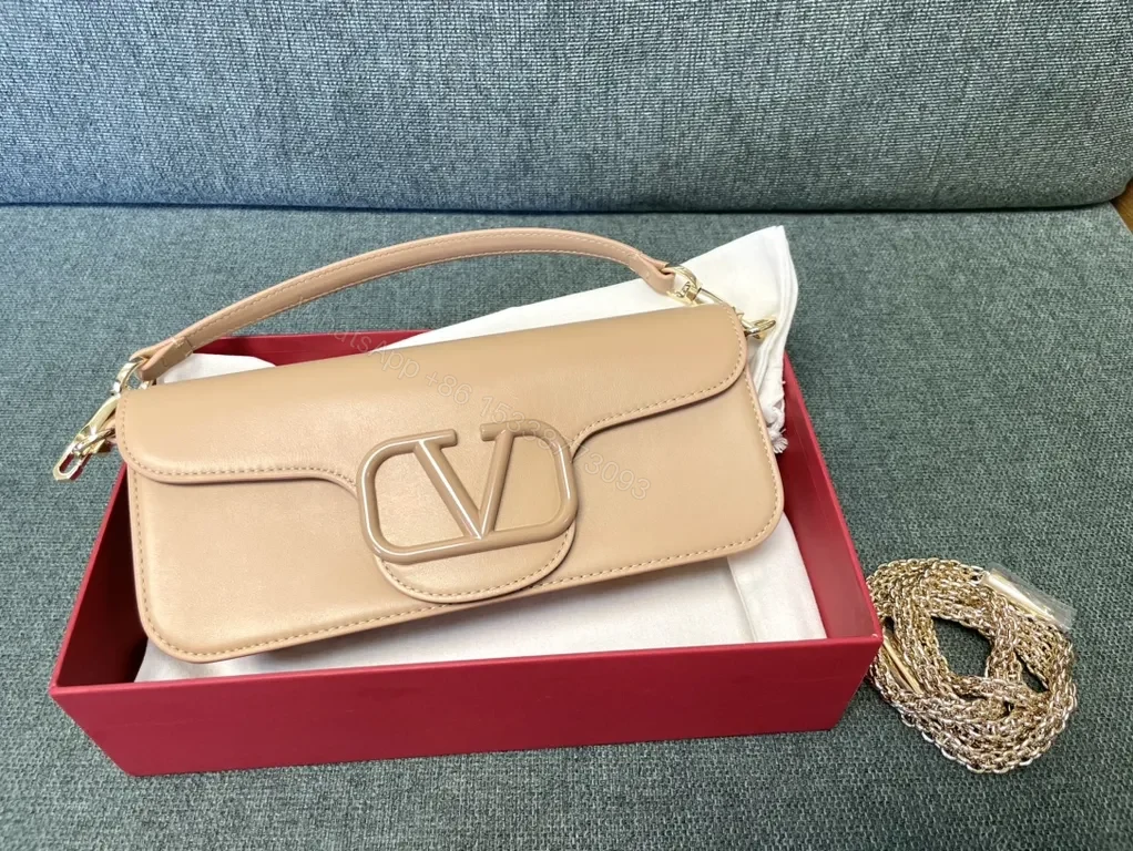 View 2 of Bold Red Leather Bag with Signature V Buckle - Luxury Crossbody