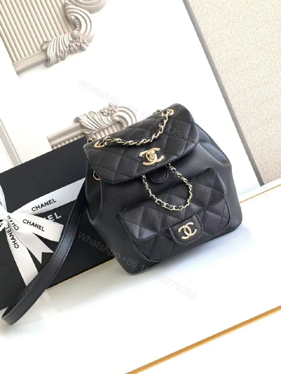 Quilted Black Backpack with Gold Hardware Luxury Mini Bag — view 1