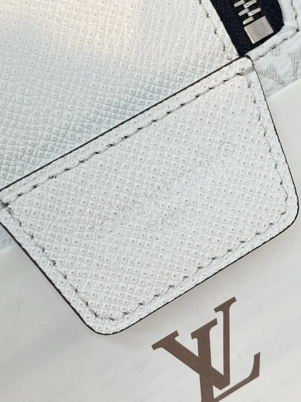 View 6 of White Leather Monogrammed Subtle LV-inspired Cosmetic Bag