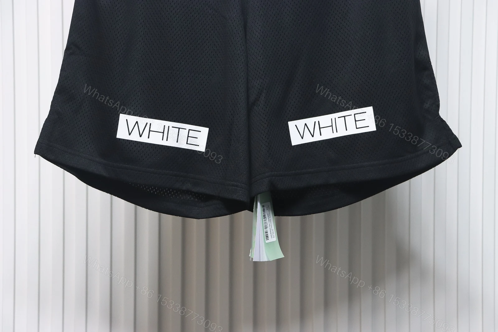 View 7 of Off-White Front Printed Mesh Shorts