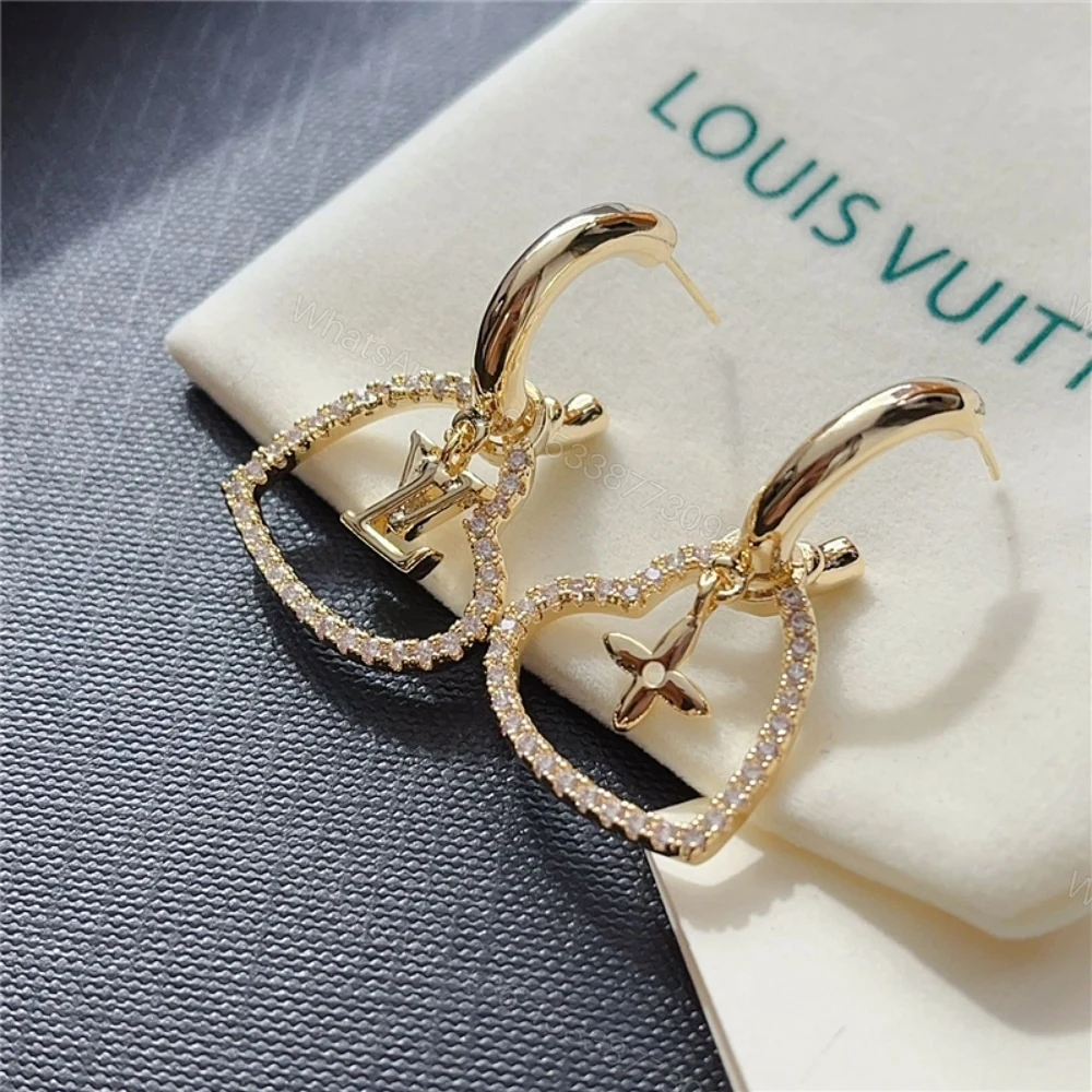 View 2 of LOUIS VUITTON HEART EARRINGS WHITE M02308