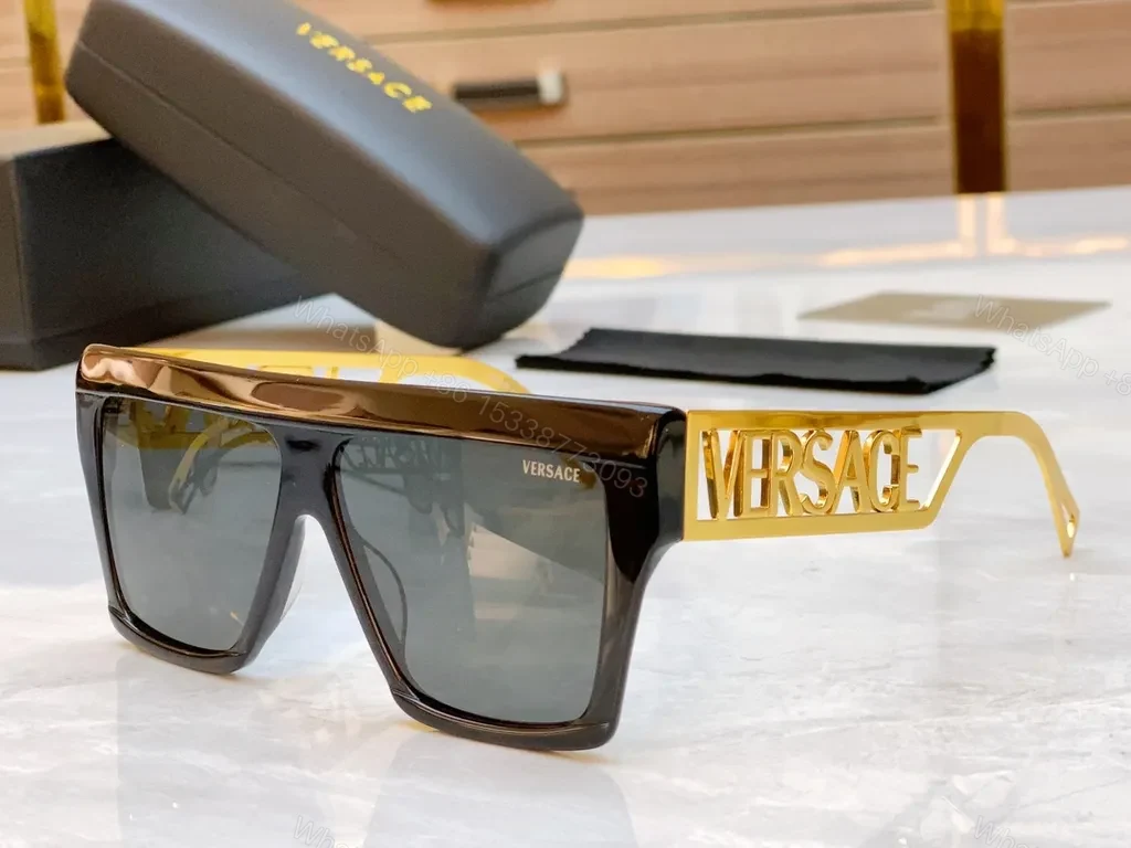 Bold Black & Gold Luxe Sunglasses - Statement Frame, All-Day Comfort — view 1