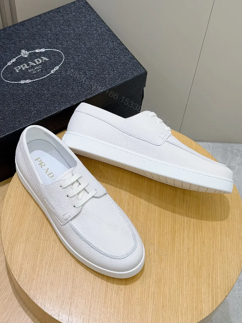 View 6 of Minimalist White Leather Low-Top Sneakers with Subtle Luxury Details
