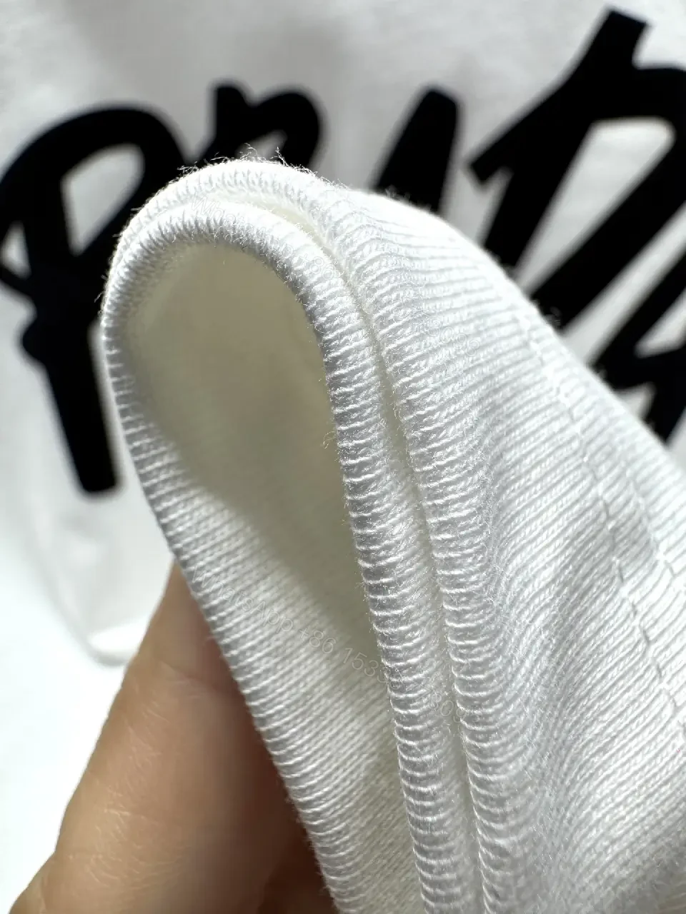 View 10 of Chic Bold Logo Cotton Tee – Modern Streetwear Fusion