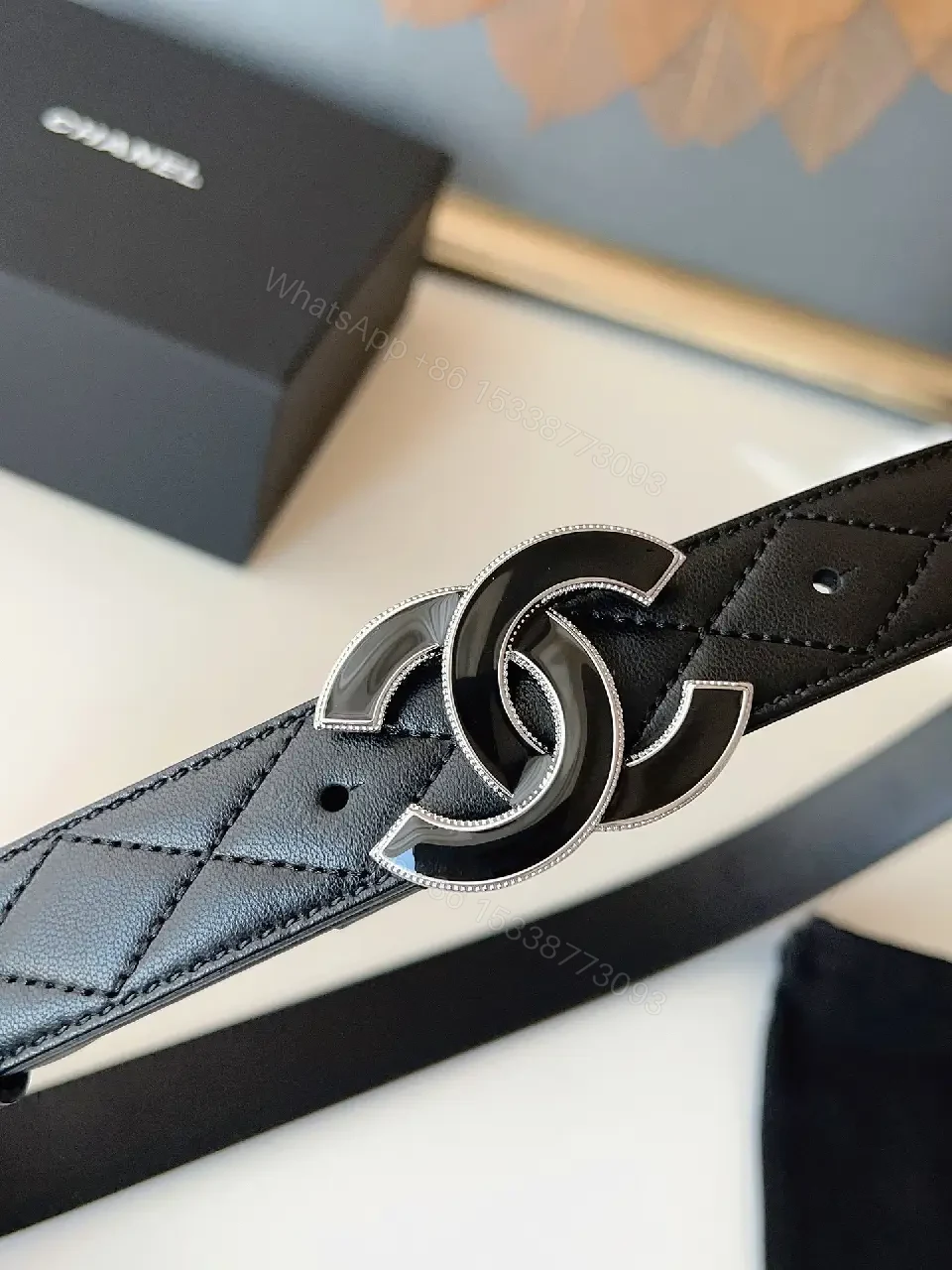 View 8 of Quilted Leather Belt with Signature Buckle - Black - Slim
