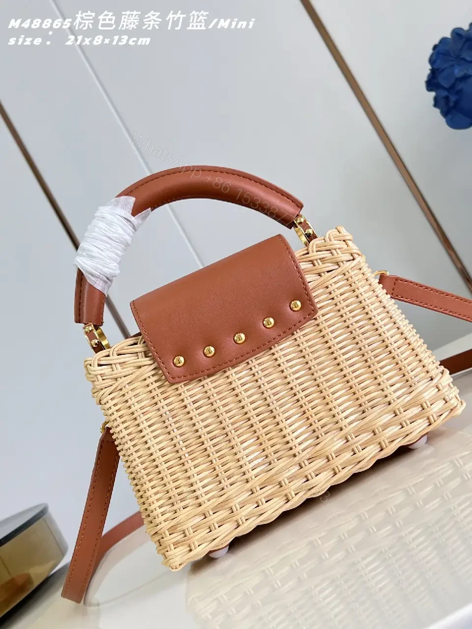 View 2 of Natural Beige Woven Leather-Trim Handbag with LV Emblem