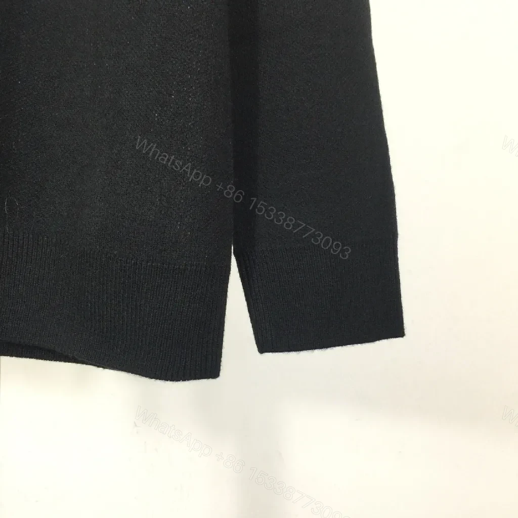 View 3 of Bold Logo Knit with Iconic Graphic Detailing — Modern Sophistication Knit
